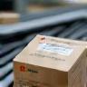 Colis Livraisons Express Nantes sur ruban transporteur